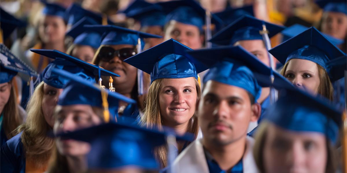 Graduates with cap and gown